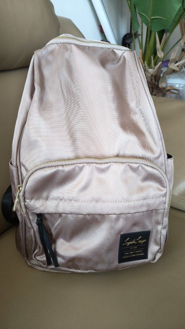 Legato Largo Backpack with Gold Zippers (Category: Backpacks) located in Pasig City. Submitted by bevvvvy (Listing ID 1430243220, Image 1). Description: super nice in actual bought in japan still with tag for pick up in Ortigas, Pasig rfs needs extra fund for dad's cancer medication.