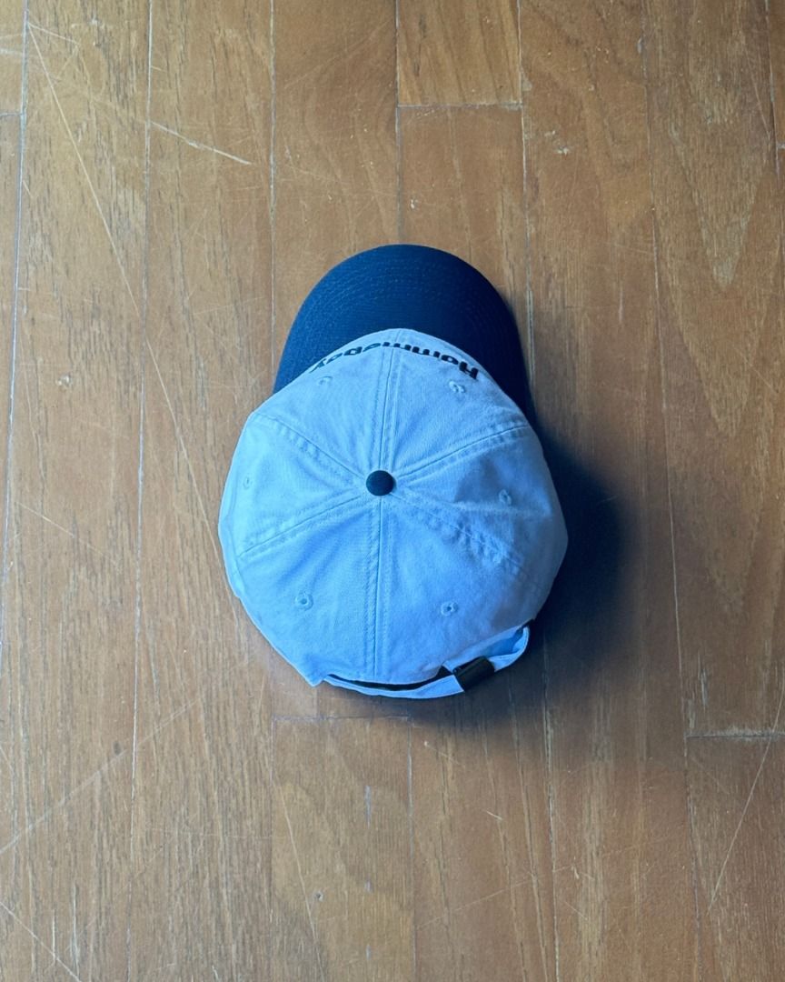 Les Hommeboys Two-Tone Hat (Category: Caps & Hats) located in Makati City. Submitted by buddybau (Listing ID 1430351712, Image 2). Description: Les Hommeboys Two-Tone Hat "White/Navy" Brand new. Never used. Original all. The Les Hommeboys Two-Tone Hat in “White/Navy” is a minimalist 6-panel cap featuring a soft white crown contrasted by a navy curved brim, finished with clean “Hommeboy” embroidery across the front for a subtle yet distinct brand 