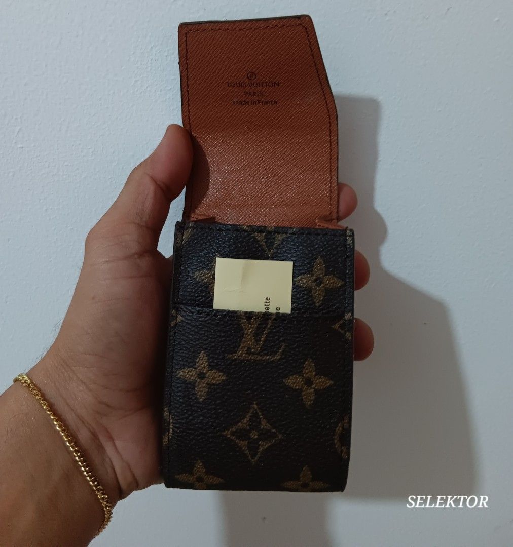 Louis Vuitton Monogram Cigarette Case (Category: Luxury Bags & Wallets) located in Dauis. Submitted by udenglegaspi (Listing ID 1430251187, Image 2). Description: Authentic Louis Vuitton Monogram cigarette case. Features the iconic LV monogram pattern. The interior is a tan color with the Louis Vuitton Paris stamp. Includes a product tag. Made in France..