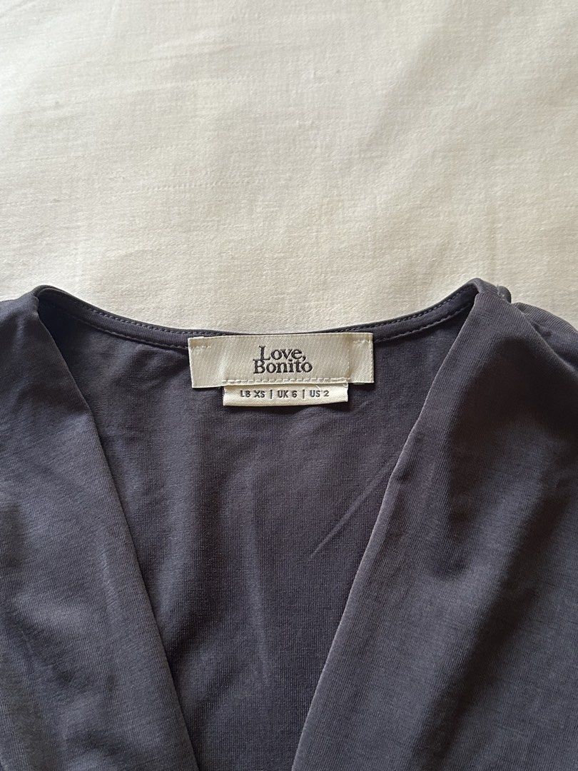 Love, Bonito | Navy Blue Twist Front Top (Category: Blouses) located in Quezon City. Submitted by springflingcloset (Listing ID 1430258510, Image 2). Description: Hey there! 👋 Check out this gorgeous Love, Bonito navy blue twist front top in XS! The twist detail adds a touch of elegance, and the color is super versatile. Grab it before it's gone!.