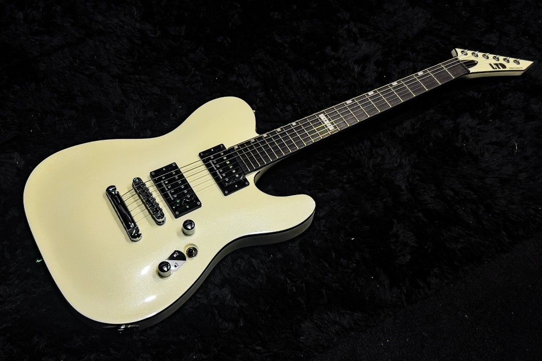 LTD Eclipse 87 NT Electric Guitar (Category: Musical Instruments) located in Manila. Submitted by jasoncammayo (Listing ID 1430215076, Image 2). Description: Brand new guitar, still in the box Body & Construction Body Material: Mahogany Finish: Pearl White Construction: Neck Thru Neck & Fingerboard Neck Material: 3 pcs Maple Neck Contour: Thin U Scale Length: 24.75" Fingerboard Material: Macassar Ebony Nut Type: Locking Frets: 24 XJ Electronics B