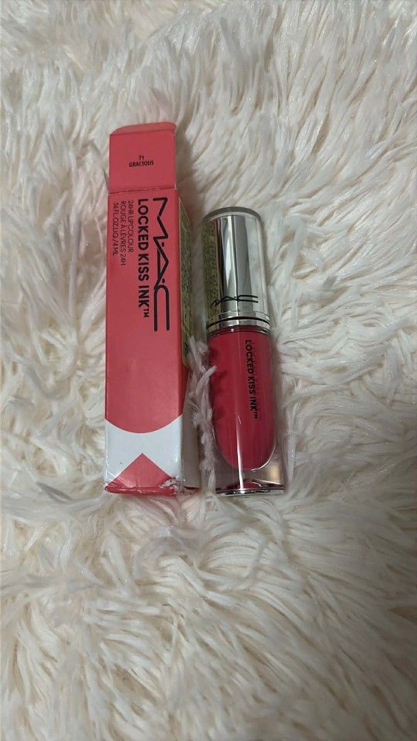 MAC Locked Kiss Ink Lipstick (Category: Makeup) located in Pugo. Submitted by abshopfinity (Listing ID 1430318207, Image 3). Description: MAC Locked Kiss Ink lipstick in various shades. The images show the lipstick with its original packaging. Available shades include: 88, 96, 11, and 86. Each lipstick is a liquid lipstick. The packaging includes the brand name and product name..