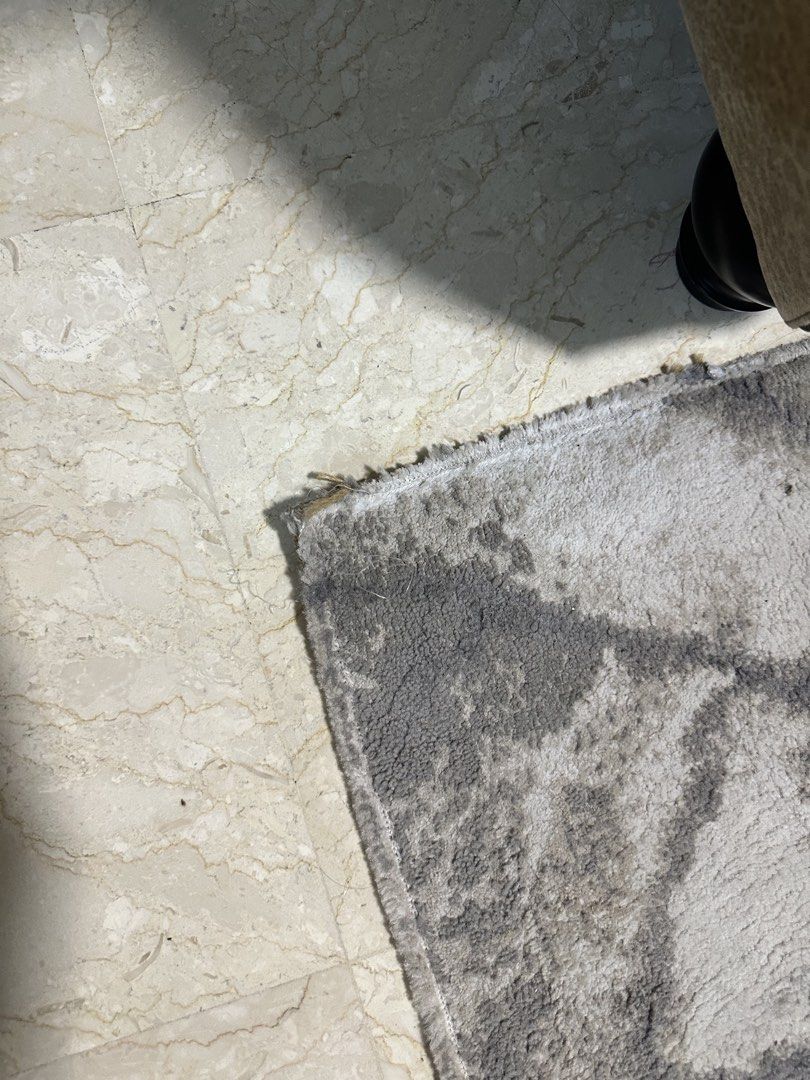 Marble Pattern Rug (Category: Carpets & Mats) located in Singapore. Submitted by seller09 (Listing ID 1430345719, Image 2). Description: Rug features a beautiful marble pattern. It has been used and shows some wear and tear, as seen in the images. It would be a great addition to any living room. Please review the photos carefully before purchasing. 200 x 300.