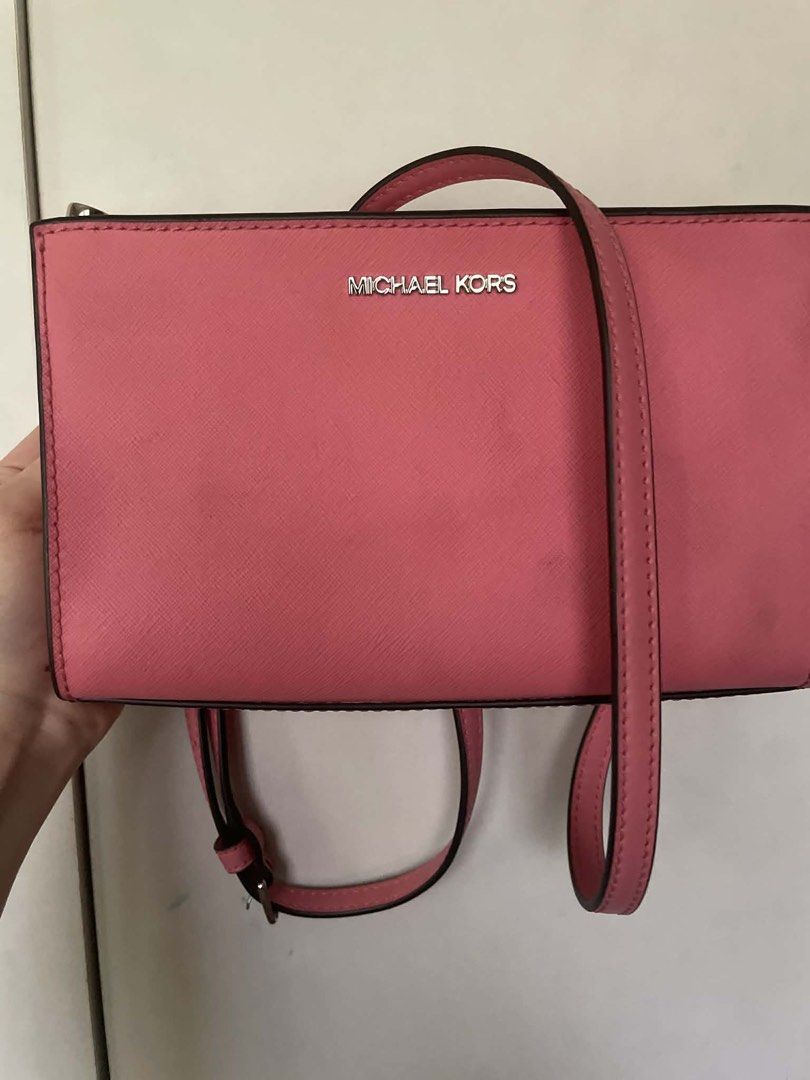 Michael Kors Pink Crossbody Bag Authentic (Category: Cross-body Bags) located in Cebu City. Submitted by greatstuffshopper (Listing ID 1430364268, Image 1). Description: Never used This was gifted from a relative coming from the US No flaws and still in pristine new condition.