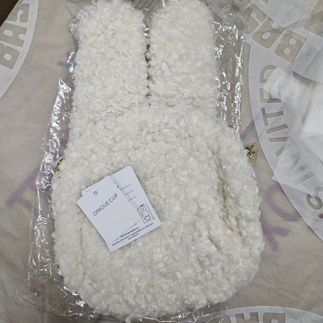 Miffy x Opaque Clip Sling Bag (Category: Shoulder Bags) located in Manila. Submitted by cam_c (Listing ID 1430342684, Image 3). Description: Brand new with tag never been used / worn like lamb wool material 1 pocket inside.