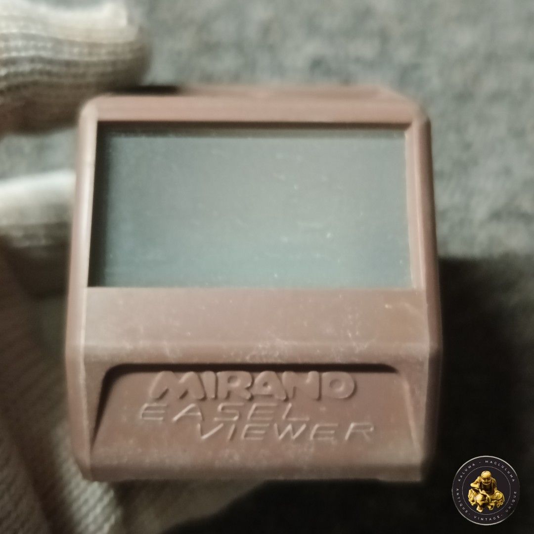 Miranda Easel Viewer Slide Film Viewer (Category: Craft Supplies & Tools) located in Meycauayan. Submitted by ka_luma (Listing ID 1430307238, Image 1). Description: Miranda Easel Viewer. It is a brown, rectangular device with a viewing screen. The brand name "MIRANDA" and "EASEL VIEWER" are printed on the front. The bottom of the device is marked "MADE IN JAPAN"..