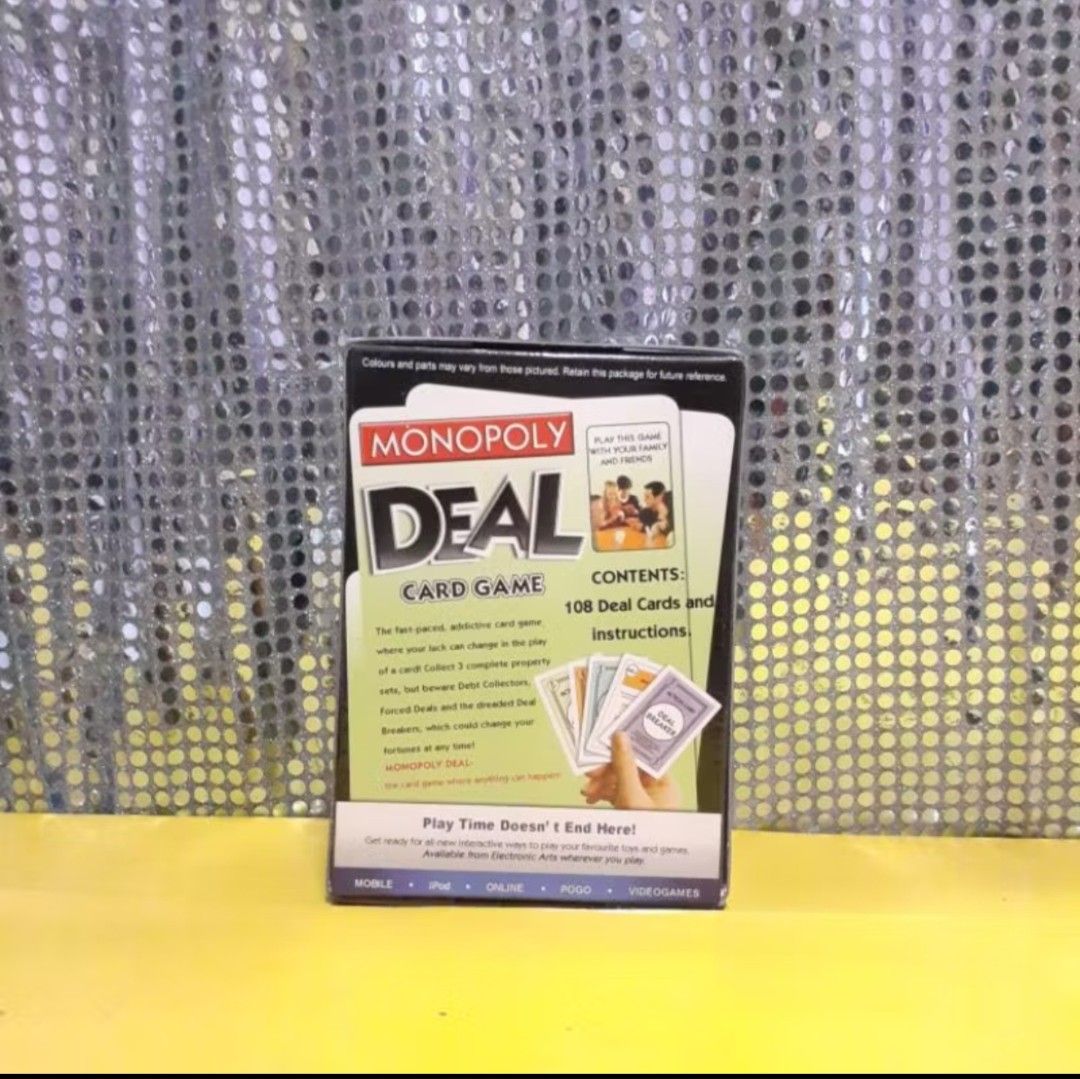Monopoly Deal Card Game (Category: Board Games & Puzzles) located in Manila. Submitted by shopwithella.ph (Listing ID 1430397216, Image 2). Description: 💯 MONOPOLY DEAL CARDS ENGLISH VERSION 💯 🌟 Please see attached photos for your entertainment. 🌟 Those photos are the actual photos inside. I photographed them on my own. Please do not use for your shop, thank you very much 🌟 🌟 WHAT'S INSIDE ???🌟 💋1 Storage for Cards 💋1 Instruction / Game 