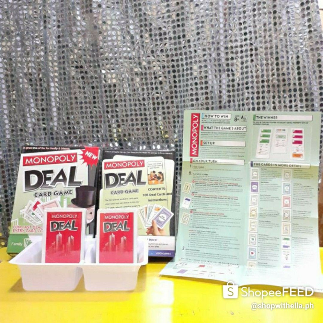 Monopoly Deal Card Game (Category: Board Games & Puzzles) located in Manila. Submitted by shopwithella.ph (Listing ID 1430397216, Image 3). Description: 💯 MONOPOLY DEAL CARDS ENGLISH VERSION 💯 🌟 Please see attached photos for your entertainment. 🌟 Those photos are the actual photos inside. I photographed them on my own. Please do not use for your shop, thank you very much 🌟 🌟 WHAT'S INSIDE ???🌟 💋1 Storage for Cards 💋1 Instruction / Game 