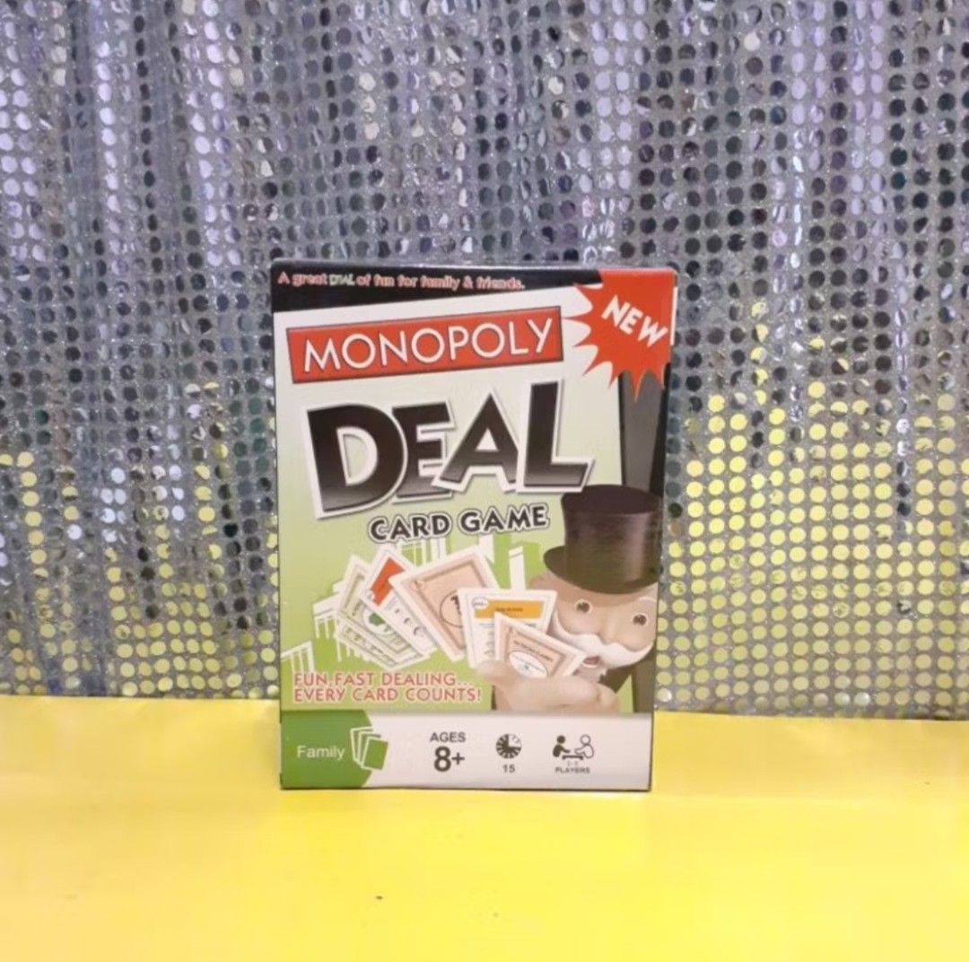Monopoly Deal Card Game (Category: Board Games & Puzzles) located in Manila. Submitted by shopwithella.ph (Listing ID 1430397216, Image 1). Description: 💯 MONOPOLY DEAL CARDS ENGLISH VERSION 💯 🌟 Please see attached photos for your entertainment. 🌟 Those photos are the actual photos inside. I photographed them on my own. Please do not use for your shop, thank you very much 🌟 🌟 WHAT'S INSIDE ???🌟 💋1 Storage for Cards 💋1 Instruction / Game 