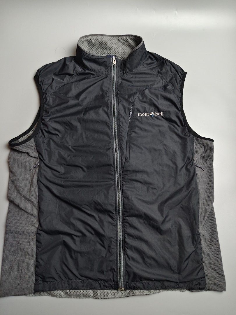Montbell ClimaPlus Mesh Vest (Category: Vests) located in Tacloban City. Submitted by solothriftfinds (Listing ID 1430338682, Image 1). Description: Montbell vest with a full zip closure. Features a black outer layer and a gray mesh lining. The vest has a stand-up collar. The inner lining is made of ClimaPlus Mesh material. The size is M for USA and Europe, and L for Japan. The vest has the Montbell logo on the chest..