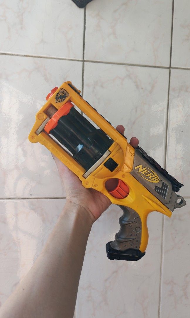 Nerf Gun (Category: Action & Battle Toys) located in Manila. Submitted by hustlefinds31 (Listing ID 1430298505, Image 1). Description: Selling Nerf Gun Maverick drum barrel complete with bullets and barrel action pistol. working just like new..