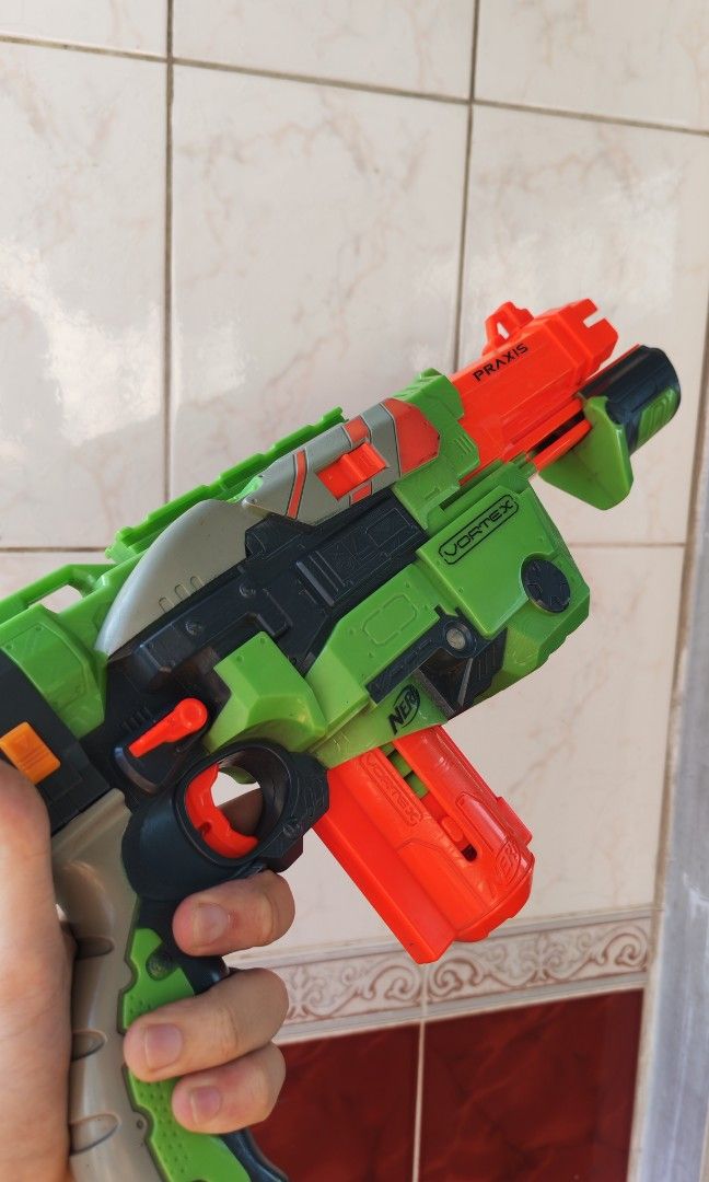 Nerf Gun Rifle (Category: Action & Battle Toys) located in Manila. Submitted by hustlefinds31 (Listing ID 1430298292, Image 2). Description: selling, Nerf Gun Cortex Praxis - Rifle/Shotgun complete with disc bullets and pump action all working with detachable shoulder support..