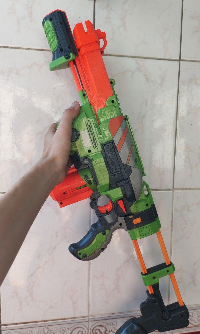 Nerf Gun Rifle (Category: Action & Battle Toys) located in Manila. Submitted by hustlefinds31 (Listing ID 1430298292, Image 3). Description: selling, Nerf Gun Cortex Praxis - Rifle/Shotgun complete with disc bullets and pump action all working with detachable shoulder support..