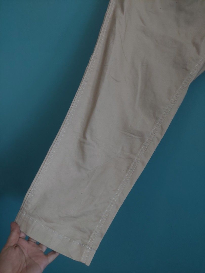 Niko and... Beige Pants - Size M (Category: Other Bottoms) located in Quezon City. Submitted by miyascloset (Listing ID 1430288267, Image 2). Description: Beige pants from Niko and. with a drawstring and button closure. Features a size M tag. The pants have a relaxed fit and appear to be made of a lightweight fabric. Details include stitching along the seams and a comfortable elastic waistband. for sale Niko and... hardly used drawstring khaki pa