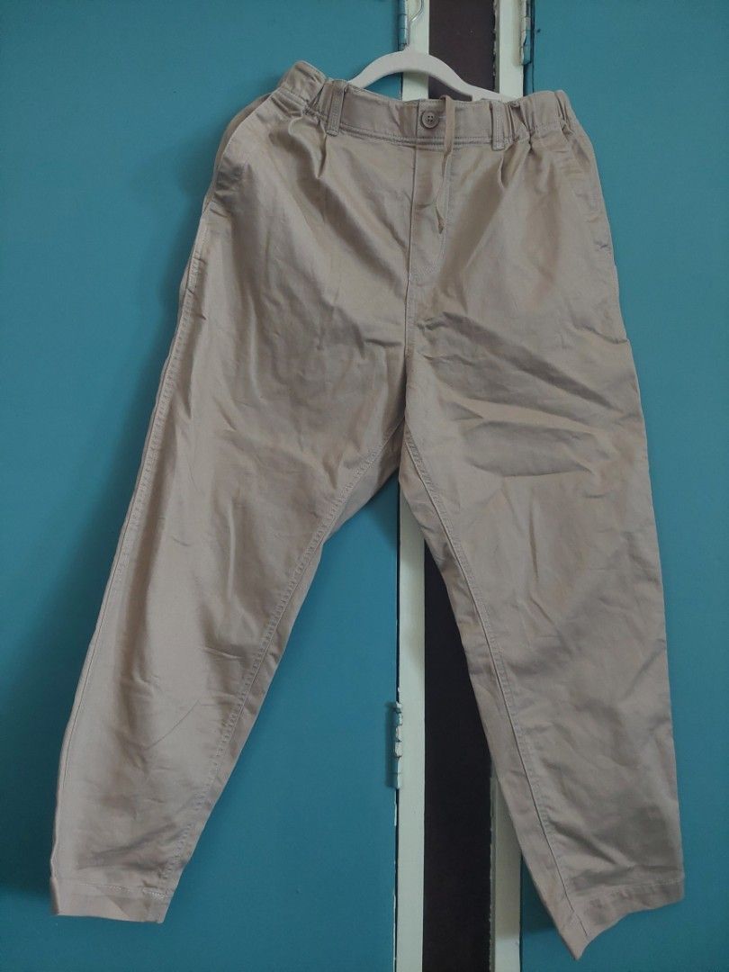 Niko and... Beige Pants - Size M (Category: Other Bottoms) located in Quezon City. Submitted by miyascloset (Listing ID 1430288267, Image 1). Description: Beige pants from Niko and. with a drawstring and button closure. Features a size M tag. The pants have a relaxed fit and appear to be made of a lightweight fabric. Details include stitching along the seams and a comfortable elastic waistband. for sale Niko and... hardly used drawstring khaki pa