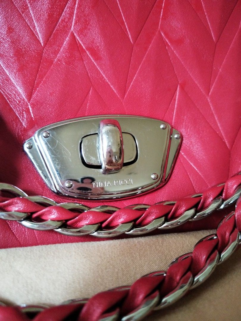 Nina Ricci Red Leather Shoulder Bag (Category: Luxury Bags & Wallets) located in Quezon City. Submitted by V_Cl0set (Listing ID 1430227706, Image 2). Description: original Nina Ricci Genuine leather very good condition very elegant and classy.