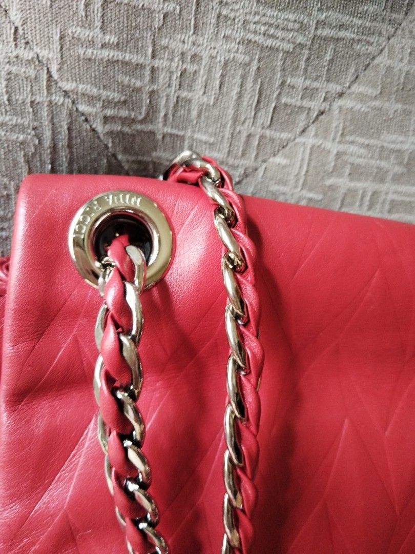 Nina Ricci Red Leather Shoulder Bag (Category: Luxury Bags & Wallets) located in Quezon City. Submitted by V_Cl0set (Listing ID 1430227706, Image 3). Description: original Nina Ricci Genuine leather very good condition very elegant and classy.