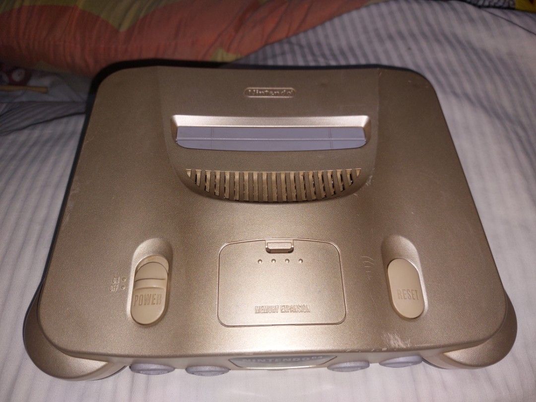 Nintendo 64 Gold Console Set (Category: Nintendo) located in Quezon City. Submitted by kushala140 (Listing ID 1430238556, Image 2). Description: Nintendo64 Limited Edition Gold Tested Working Good All Buttons Good Games Good Controller Good Power Supply 220V With Original Games 8pcs (7japan 1USA) Original Controller 1pcs Original AV Cable Original Power Supply 220V Check out pictures for more details 10k php Cash/Gcash No warranty Test2sawa only 