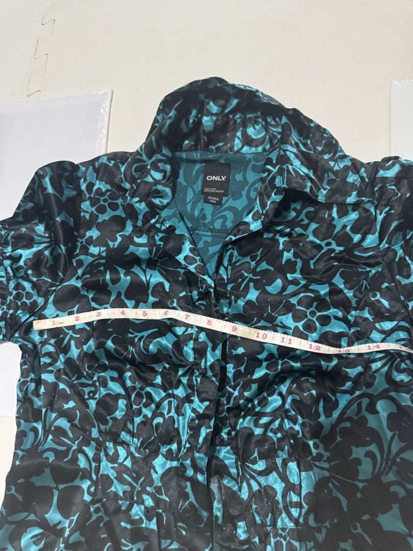 ONLY Teal and Black Floral Blouse (Category: Blouses) located in Balanga. Submitted by psyche1221 (Listing ID 1430326379, Image 3). Description: May fit small to semi medium. Pwedeng pang formal din kasi parang satin ang dating nya. .