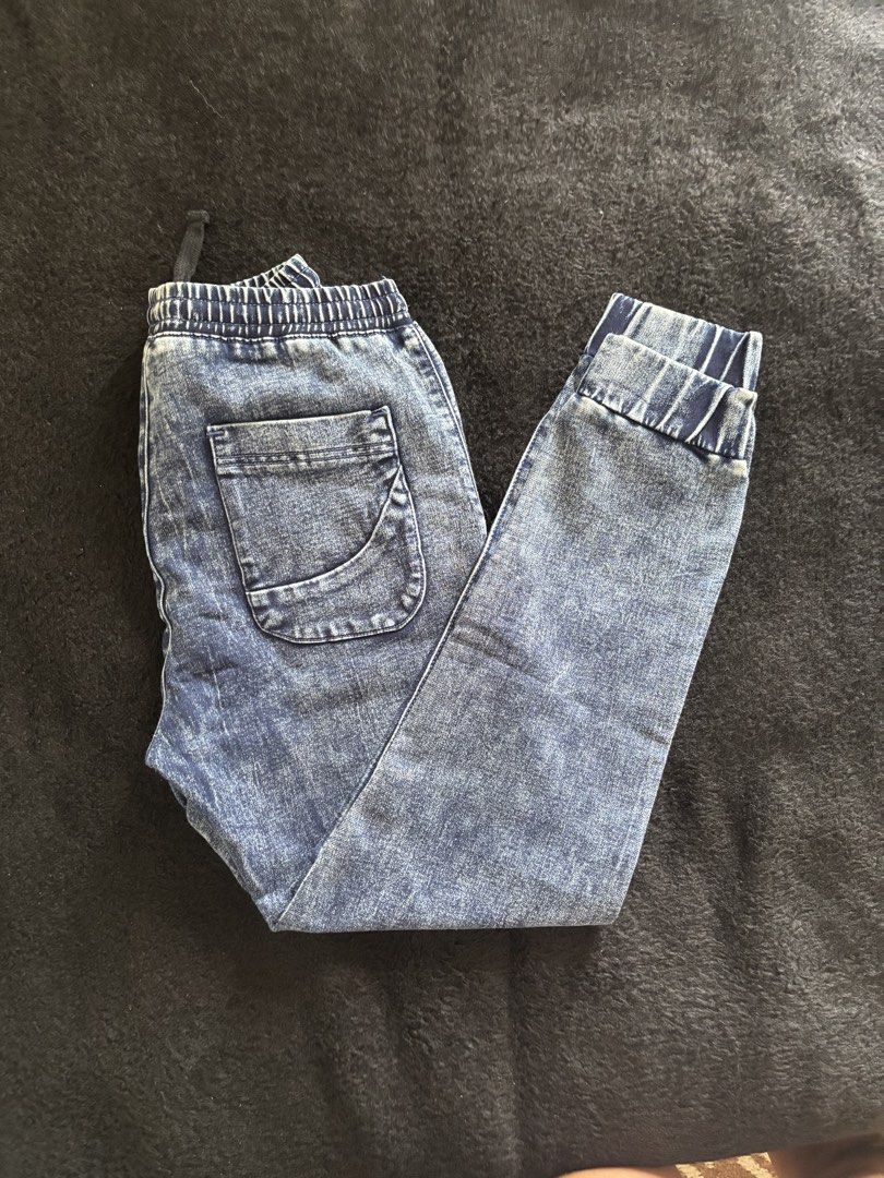 Penshoppe Denim Jogger Pants - Small (Category: Joggers) located in Quezon City. Submitted by donbuys (Listing ID 1430243944, Image 2). Description: These denim jogger pants from Penshoppe feature an elastic waistband and cuffs. They have a drawstring and a single back pocket. The size is Small. The waist measures approximately 13 inches, and the length of the cuff is about 36 inches..