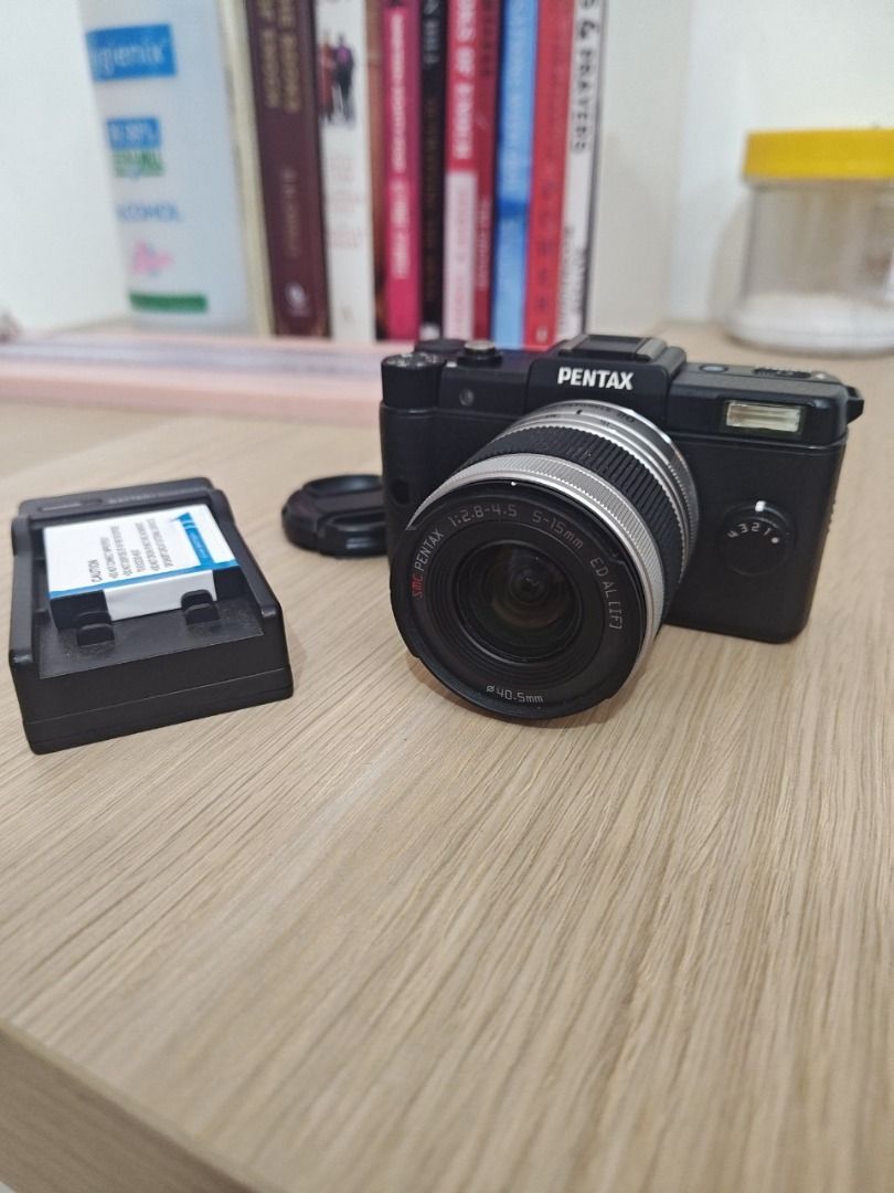 Pentax Q + 02 Zoom Lens (Low Shutter Count) (Category: Cameras) located in Makati City. Submitted by shootblack.8923 (Listing ID 1430263853, Image 1). Description: Condition Fully functional Shutter count only 1,407 (very low usage) Cosmetic wear from normal use (see photos) Includes 1. Pentax Q body 2. Pentax 02 Standard Zoom Lens (5–15mm f/2.8–4.5) 3. 2x batteries 4. 1x charger Honest Issues (being transparent) 1. Port cover is missing 2. Small