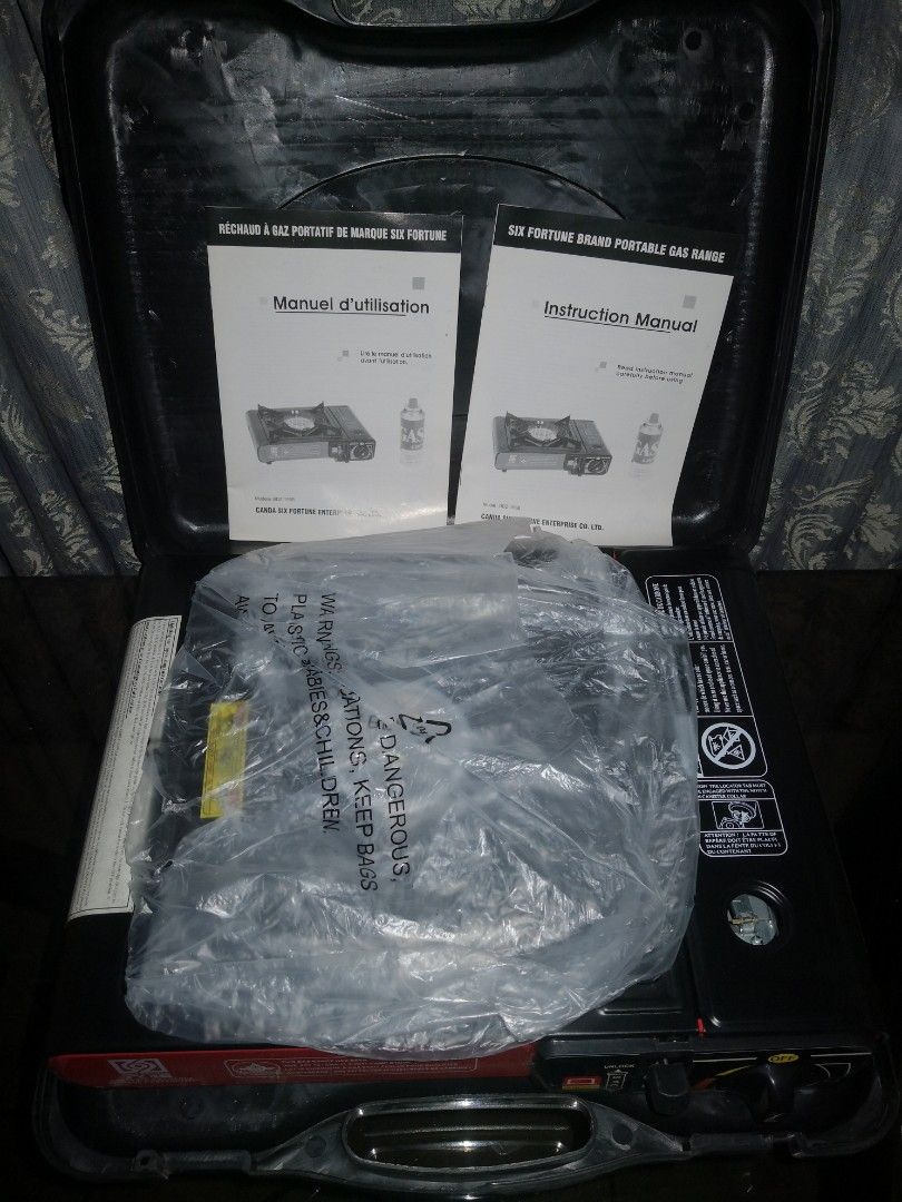 Portable Butane Gas Stove (Category: Cookers) located in Mandaluyong City. Submitted by ilovemyshop (Listing ID 1430266687, Image 2). Description: Perfect for emergency cooking or camping. Purchased in Canada, tested by the store but never get a chance to use. Complete with plastic, English and Canadian French manuals.