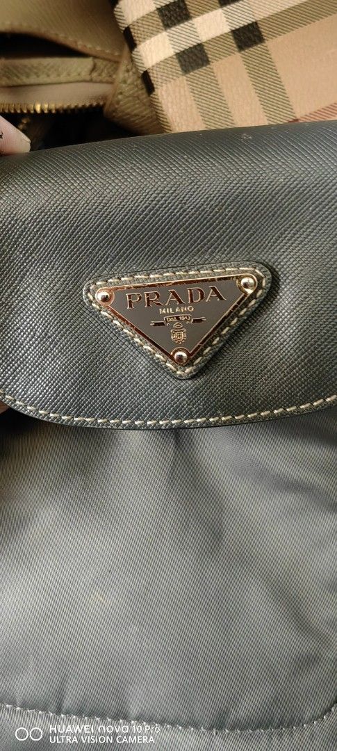 Prada 2way Handbag shoulder (Category: Luxury Bags & Wallets) located in Bacolod City. Submitted by darriebags88 (Listing ID 1430257006, Image 2). Description: no rubs no bubbles.slight disco.