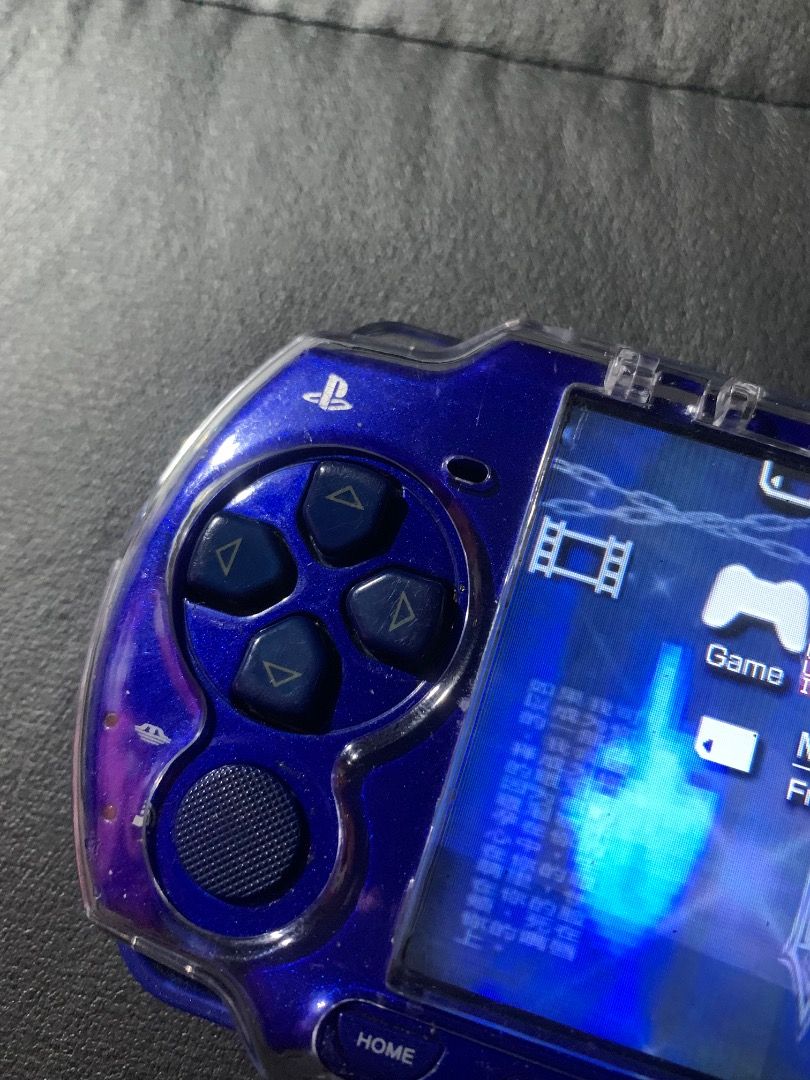 PSP 2000 SLIM (Category: PlayStation) located in Las Pinas. Submitted by headintheceilingfan (Listing ID 1430239605, Image 3). Description: For sale psp 2000 slim jailbreak may kasamang case , charger , clear case issue may tanggal na paint sa likod dahil sa sticker may one dot green pixel di naman halata joystick drifting minsan lang pero gooods naman .