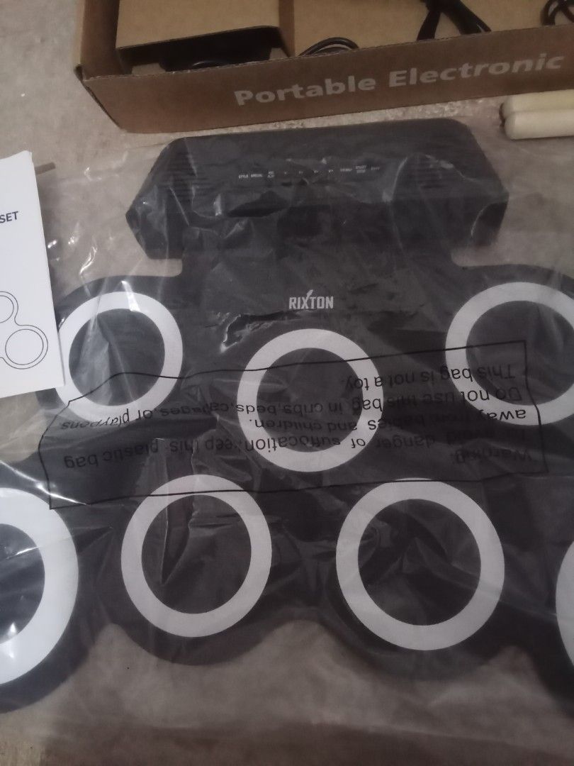 Rixton Portable Electronic Drums Set (DDP006 SPK-BLACK) (Category: Musical Instruments) located in Morong. Submitted by gakushuu (Listing ID 1430321024, Image 2). Description: Inclusion: -Drum Pad with Built in Speakers -Pedals -Drumsticks -Aux Cable -Type C Cable MOP: GCASH MOD: J&T LALAMOVE Like New, Used for like 2 times only (Need po fund kaya byebye hobby).