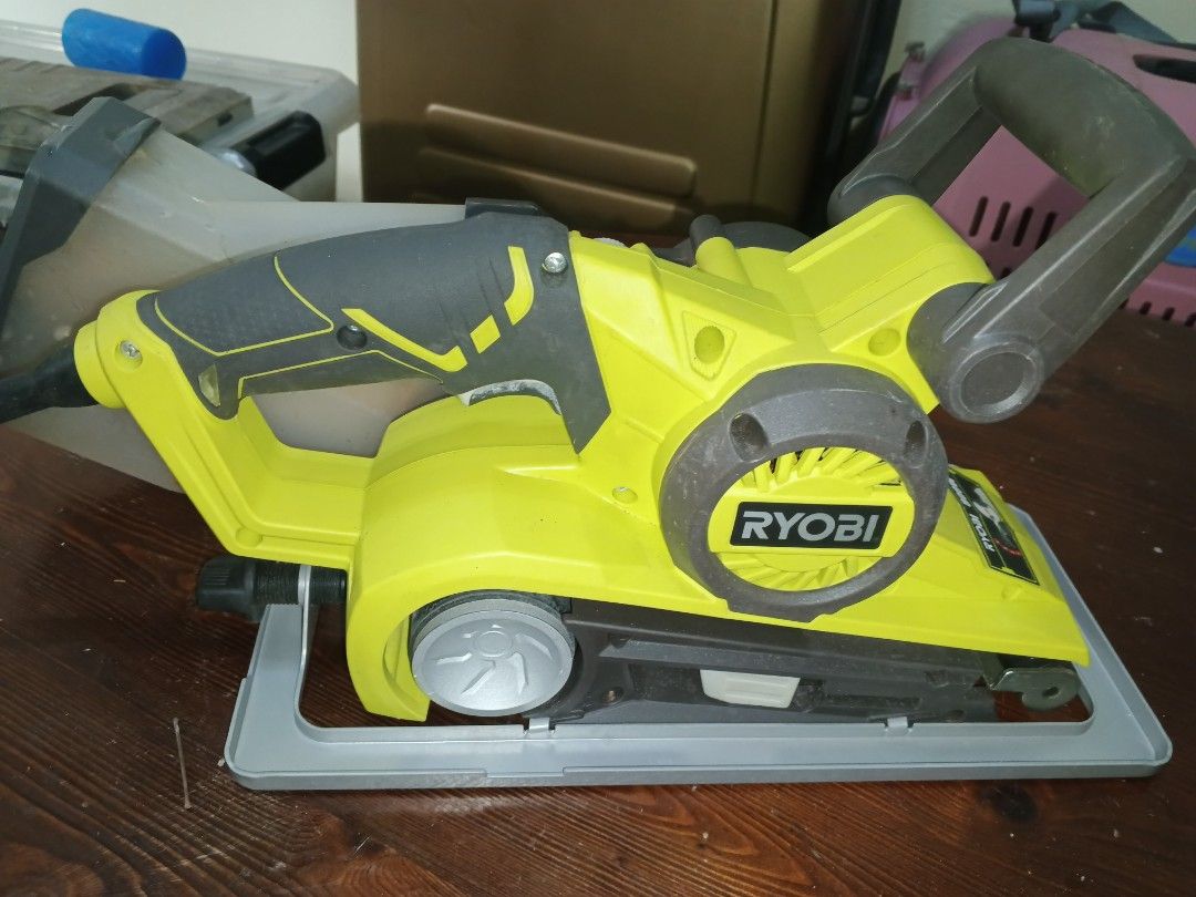 Ryobi 800W Belt Sander (Category: Belts) located in Caloocan City. Submitted by surplusandbnewshop (Listing ID 1430283423, Image 3). Description: Ryobi 800W belt sander with dust collection system. Includes the original box and a frame. Features variable speed control and micro filtration. The sander is yellow and gray. The dust collection container is included. The power cord is also included..