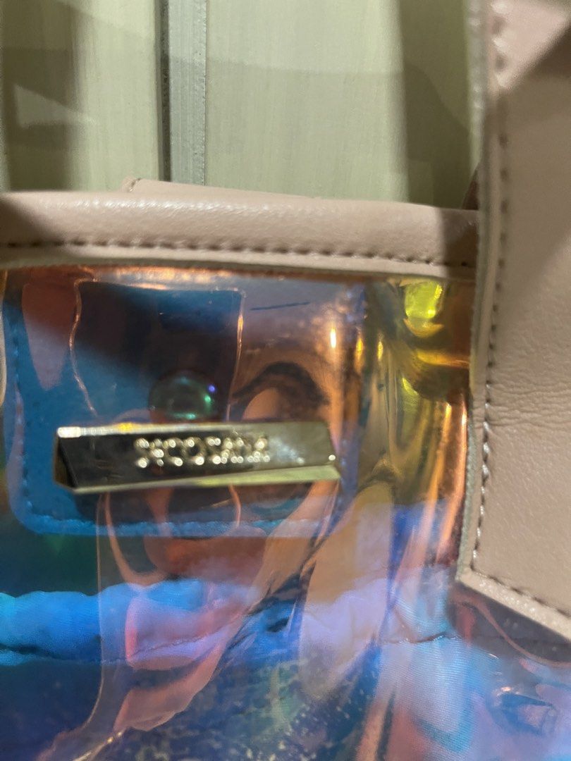 Secosana Hologram shoulder bag (Category: Shoulder Bags) located in Mandaluyong City. Submitted by kately18 (Listing ID 1430347887, Image 2). Description: - Secosana Hologram shoulder bag. - Features a unique holographic design. - Includes a convenient shoulder strap. - Perfect for adding a stylish touch to your look..