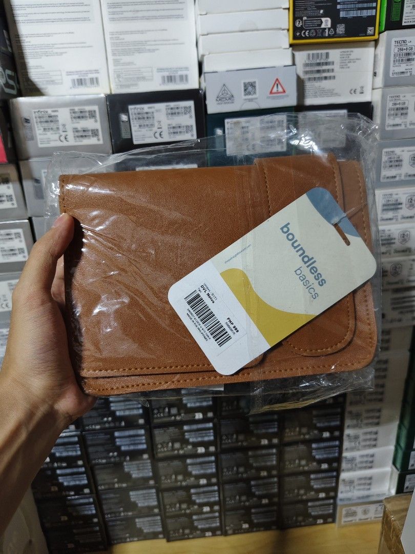 Straightforward Boundless Basics Bag (Category: Luxury Bags & Wallets) located in Marilao. Submitted by declutterwjosh13 (Listing ID 1430352036, Image 2). Description: Brown bag from Straightforward. It has a flap closure with a magnetic snap. The bag has a main compartment and a small pocket inside. The brand tag is still attached..