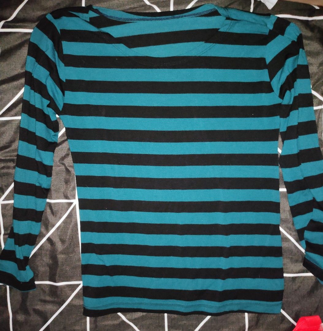 Striped Long Sleeve Shirt (Category: Longsleeves) located in Manila. Submitted by thatstyle (Listing ID 1430310535, Image 1). Description: Long-sleeved shirt features horizontal stripes in teal and black. It has a scoop neckline and a fitted silhouette. It's a versatile piece that can be worn casually or layered for a more stylish look..