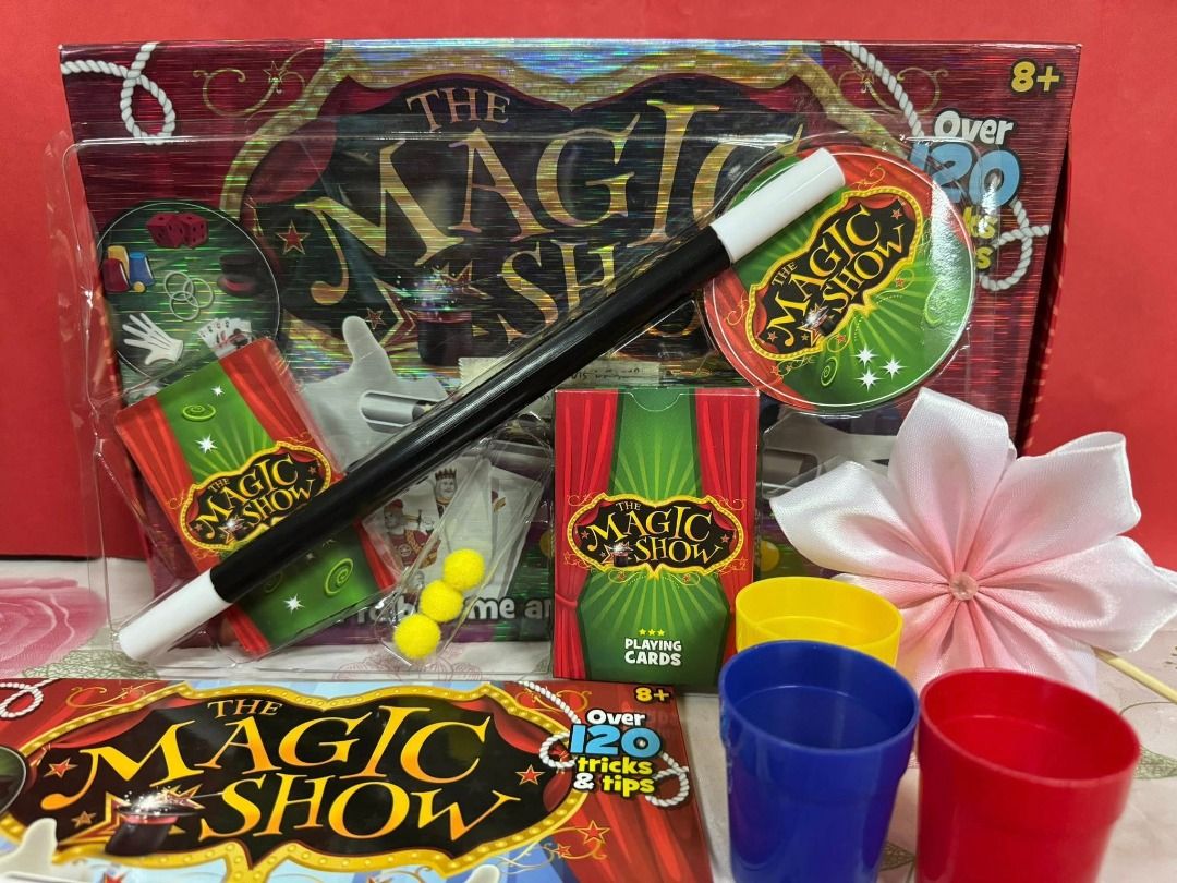 The Magic Show Set (Category: Board Games & Puzzles) located in Caloocan City. Submitted by brightgamesph (Listing ID 1430250766, Image 1). Description: "AS IS" - WYSIWYG Magic Show features playing cards, cups, balls, a magic wand, and other accessories. This set is designed for ages 8 and up. It is a complete set for aspiring magicians..