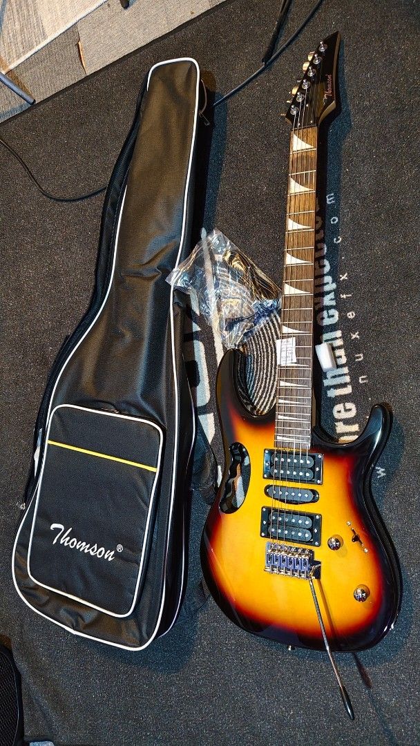 Thomson Electric Guitar with Case jem (Category: Musical Instruments) located in Pasig City. Submitted by tupriomichaeljohn (Listing ID 1430247194, Image 1). Description: paubos pm 4k only.