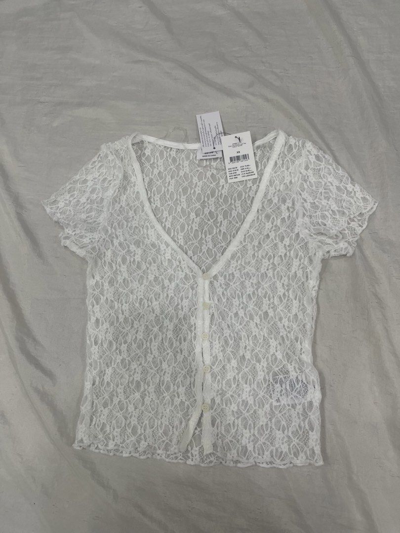 Top Sheer Lace V-neck Top (Category: Shirts) located in Quezon City. Submitted by princesssparklee (Listing ID 1430324346, Image 2). Description: No haggling please. Last price posted. - fits XS-S - no when worn RFS: not being used. Decluttering.