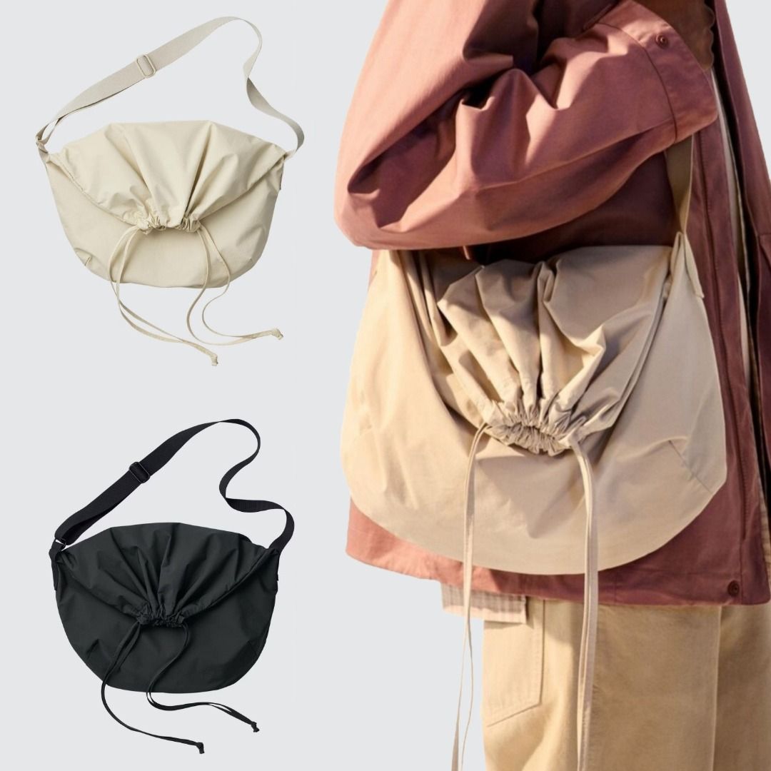 Uniqlo Drawstring Shoulder Bag - Natural/Black (Category: Shoulder Bags) located in Nagcarlan. Submitted by mrloski (Listing ID 1430396140, Image 1). Description: BRAND NEW, with tag Uniqlo Drawstring Shoulder Bag P1400 ea +sf Available: Natural Black Size: Height: 60cm Width: 46cm Depth: 9cm Strap Length: 113cm Product color may differ slightly due to lighting. DM for more details..