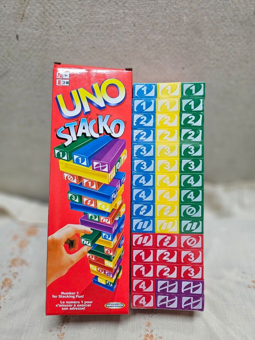 Uno Stacko Jenga Tower Block Game (10.5in) (Category: Board Games & Puzzles) located in Manila. Submitted by shopwithella.ph (Listing ID 1430304714, Image 1). Description: 💯 UNO STACKO JENGA TOWER BIG SIZE (10.5inches) BRAND NEW, SEALED, HIGH QUALITY 💯 🌟 Please see attached photos for your entertainment 🌟 🌟 Those photos are the actual photos inside. I photographed them on my own. Please do not use for your shop, thank you very much 🌟 🌟 Not