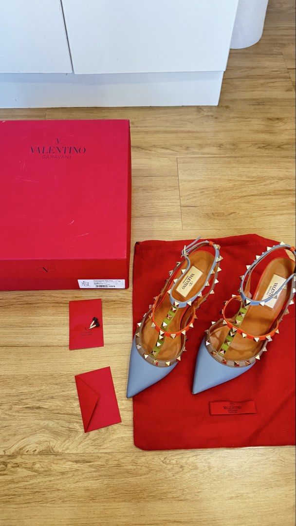 Valentino Garavani Rockstud Slingbacks Size 38 (Category: Heels) located in Pasig City. Submitted by decltter01 (Listing ID 1430267639, Image 2). Description: Valentino Rockstud Italian Leather Slingbacks Size 38, 10cm heel Color: multicolor: dusty blue, green, rust - Comes in original box, with original extra studs - Worn once for a hotel function event (carpeted) - signs of wear on the pointed toe area (see photos for actual condition) - very m