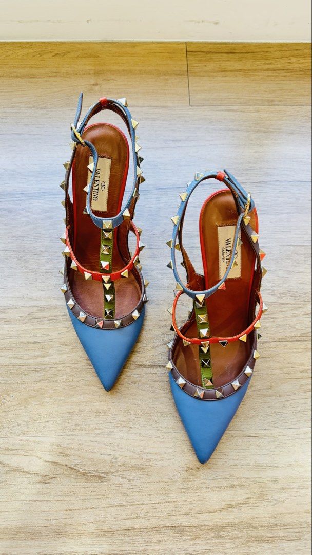 Valentino Garavani Rockstud Slingbacks Size 38 (Category: Heels) located in Pasig City. Submitted by decltter01 (Listing ID 1430267639, Image 1). Description: Valentino Rockstud Italian Leather Slingbacks Size 38, 10cm heel Color: multicolor: dusty blue, green, rust - Comes in original box, with original extra studs - Worn once for a hotel function event (carpeted) - signs of wear on the pointed toe area (see photos for actual condition) - very m