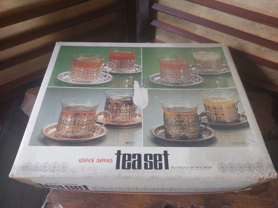 Vintage 1980's Series Copper Tea Set (Category: Coffee & Tea Tableware) located in Bulacan. Submitted by hnbfinds (Listing ID 1430260493, Image 2). Description: The Ultimate 1980s Showa-Era Treasure ☕✨ Stepping back into 1980s Japan with this complete 15-piece Grace Series Tea Set. 🇯🇵 This isn't just a tea set; it’s a piece of Showa-era history. Featuring five heat-resistant glasses nestled in intricate, copper-finished filigree holders with ma