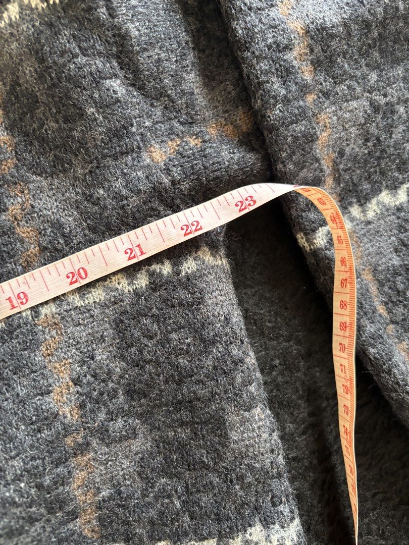 Vintage Plaid Cardigan (Category: Coats, Jackets and Outerwear) located in Quezon City. Submitted by donbuys (Listing ID 1430251795, Image 3). Description: Vintage cardigan features a classic plaid pattern in shades of gray, brown, and white. It has a V-neckline, button-down closure, and two front pockets. The sleeves have ribbed cuffs. Measurements are provided in the images..