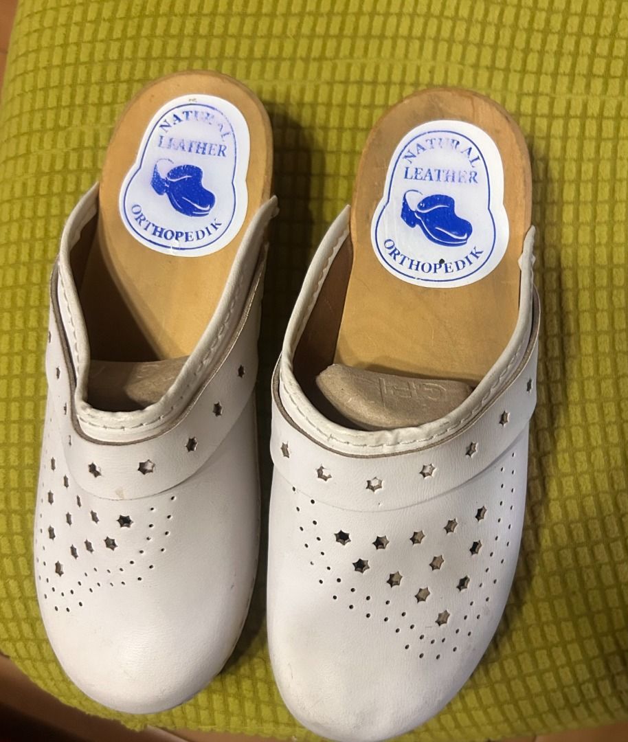 White Orthopedik Natural Leather Clogs (Category: Flats & Sandals) located in Paranaque City. Submitted by swiftarrow2026 (Listing ID 1430337118, Image 2). Description: White clogs made of natural leather. The insole has a wooden base. .