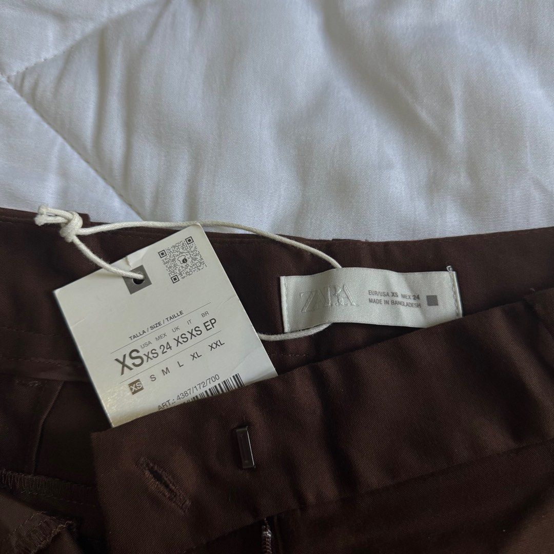 Zara Brown Shorts (Category: Shorts) located in Manila. Submitted by shop.declutter (Listing ID 1430299115, Image 2). Description: Xs on tag! Runs a bit big Perfect for waist sizes 26-27 Brand new.