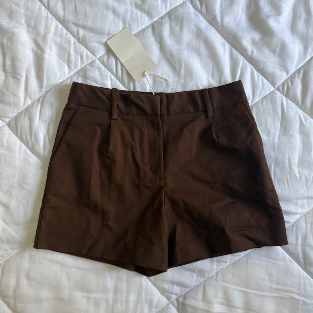 Zara Brown Shorts (Category: Shorts) located in Manila. Submitted by shop.declutter (Listing ID 1430299115, Image 1). Description: Xs on tag! Runs a bit big Perfect for waist sizes 26-27 Brand new.