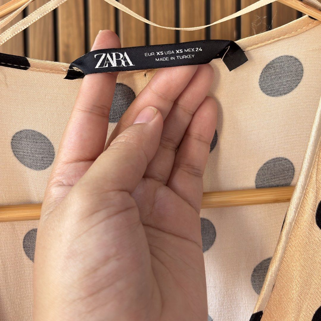 ZARA Polka Dot Wrap Dress (Category: Dresses) located in Cavite. Submitted by declutteringmama12 (Listing ID 1429250289, Image 3). Description: ZARA Polka Dot Wrap Dress 🩷 Size: XS (fits XS–S) • Wrap style • Flowy • Lightweight • Effortless chic look ✨ Perfect for brunch, errands, or travel fits ✈️ ⚠️ Flaw: Slight himulmol at the back (not noticeable when worn) 🌸 Super classy piece 🛍️ RFS: Closet reset after becoming a mama — hoping this finds