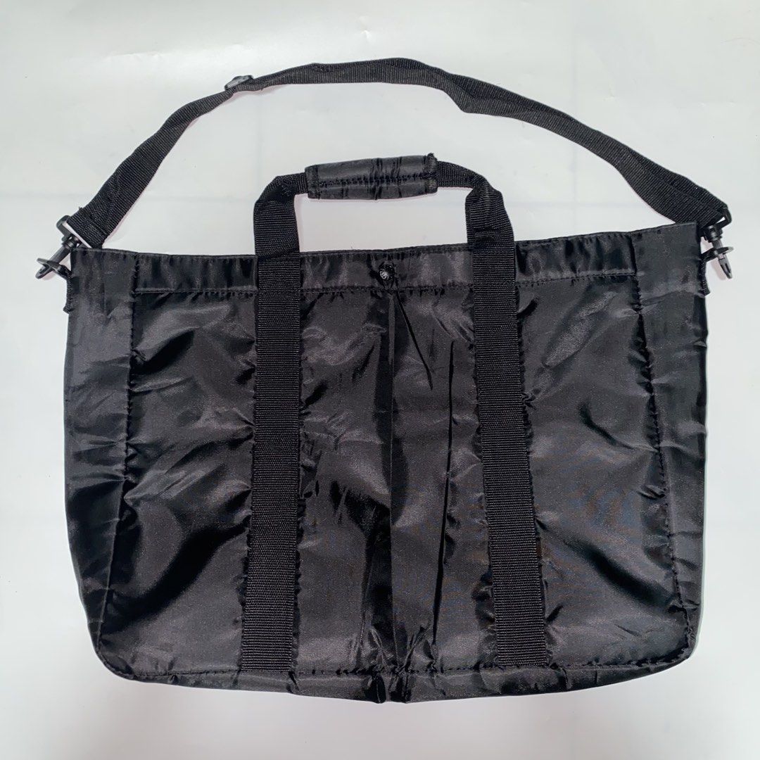 A Bathing Ape Two-Way Nylon Tote Bag (Category: Tote Bags) located in Manila. Submitted by sometimesalways (Listing ID 1430557027, Image 2). Description: A Bathing Ape Two-Way Nylon Tote Bag Large compartment, very spacious Can be used as a: Tote, Shoulder, Sling bag Issue/s: N/A Price: 1500 Shipped (for J&T Express only).