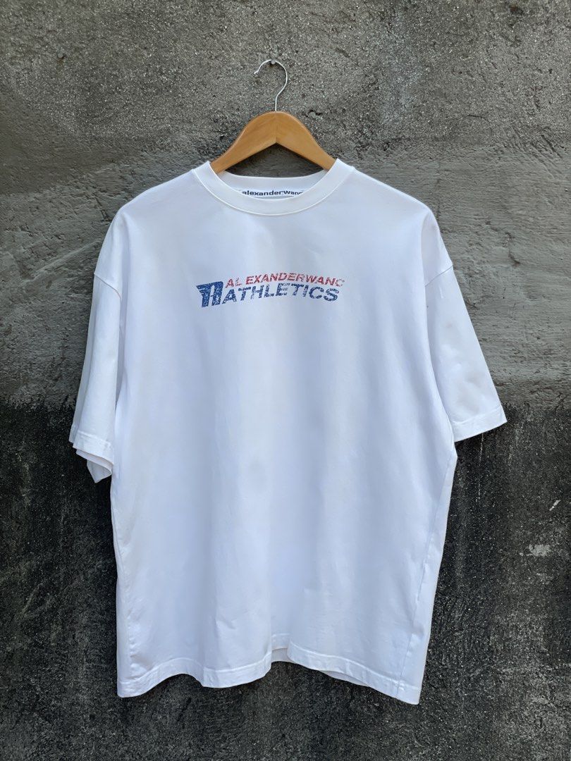 Alexander Wang Athletics White T-shirt (Category: Luxury Apparel) located in Makati City. Submitted by christian_g (Listing ID 1430574209, Image 1). Description: Alexander Wang R Athletics •Size: XL (30L 24W) •Excellent condition •No issue.