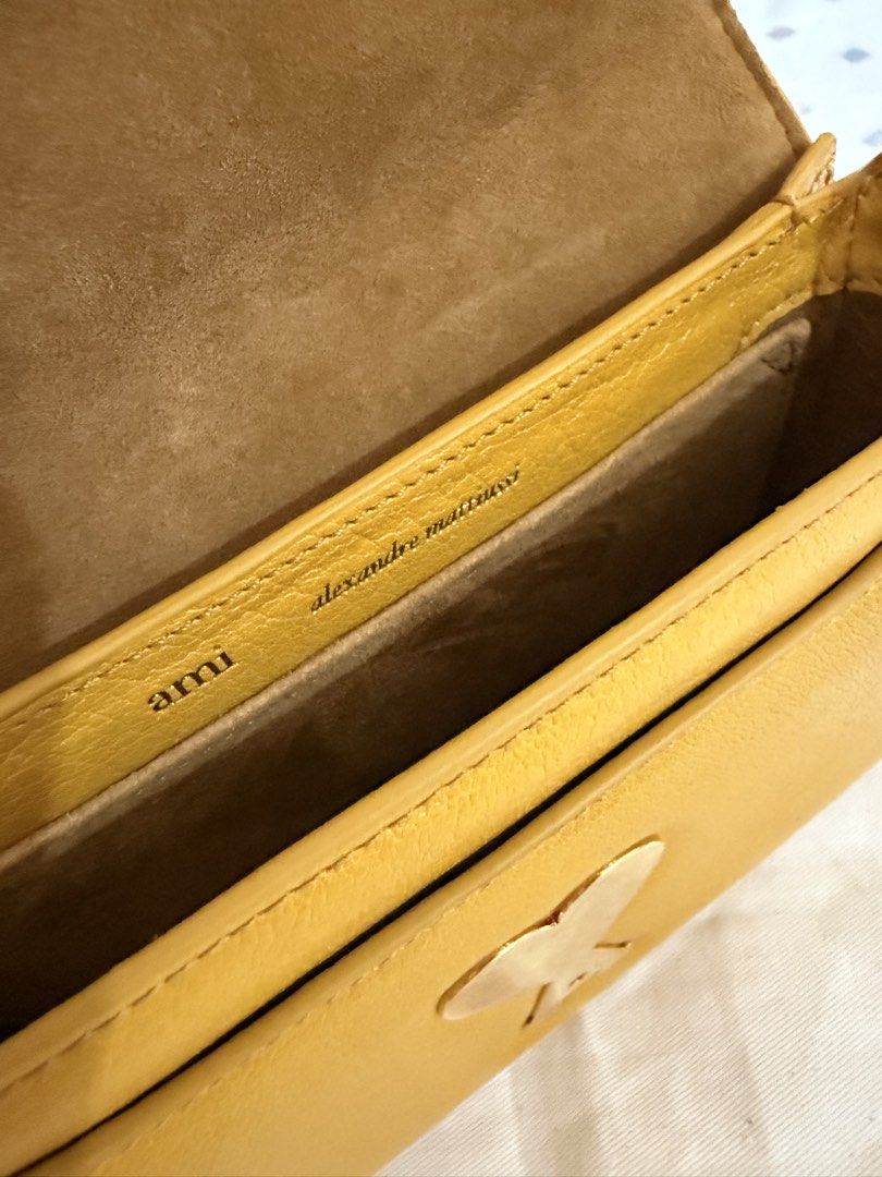 AMI Paris (Category: Luxury Bags & Wallets) located in Paranaque City. Submitted by akpoker (Listing ID 1430596958, Image 2). Description: Made from cowhide leather. Complete with receipt, dust bag and paper bag. Bought it from Gotemba Ami Store at 50% regular retail price. Never used. Fits iPhone ProMax.