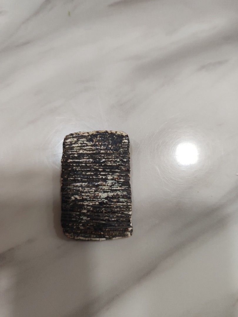 Antique Rectangular Stone (Category: Other Home Decor) located in Singapore. Submitted by peh56 (Listing ID 1430440207, Image 2). Description: Antique rectangular stone with a unique design. The stone has a black and white colour scheme. A great item for collectors..